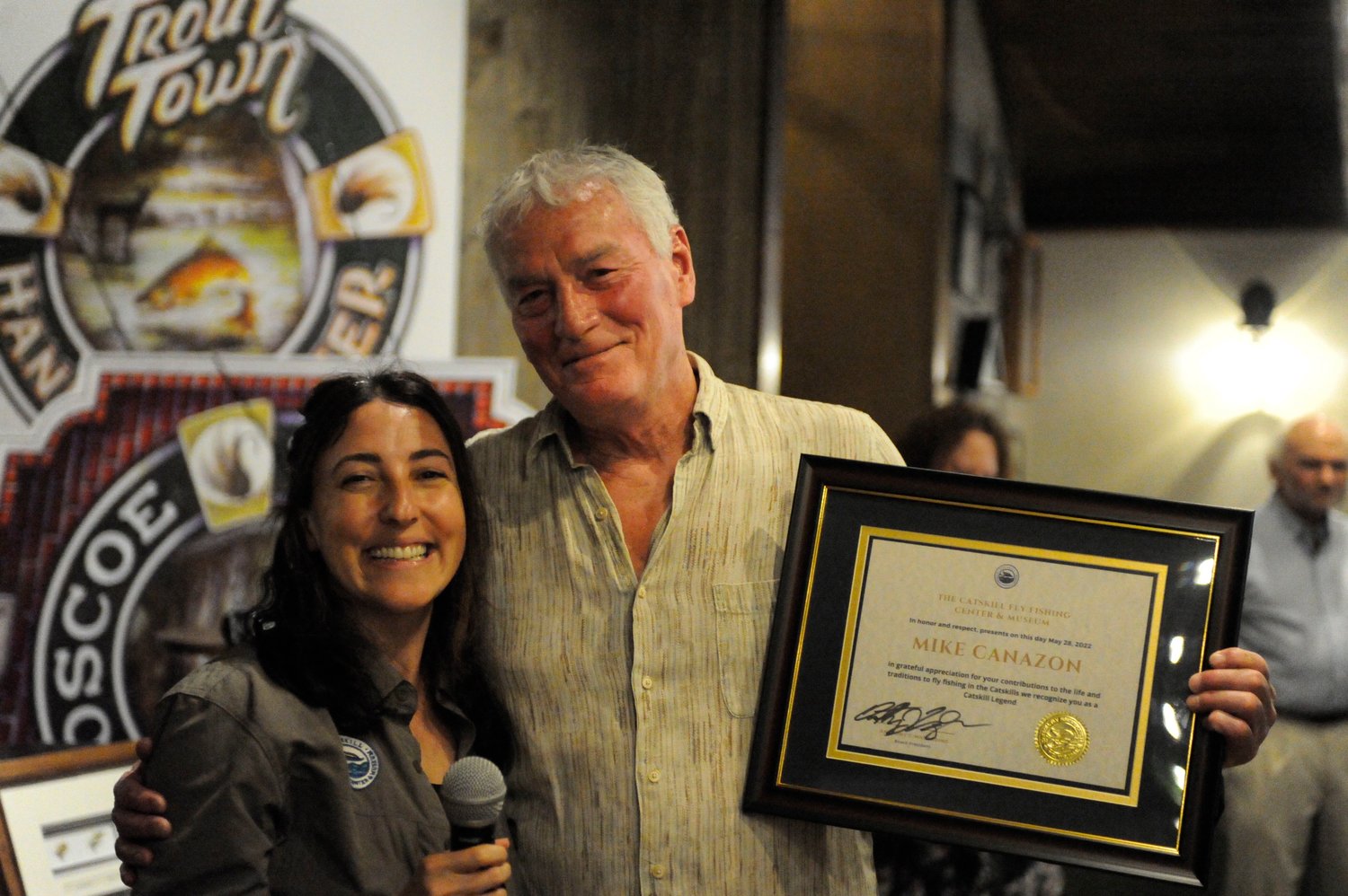 Catskill Legend Mike Canazon grew up finger-fishing, and later became a well-respected fishing guide and master split-cane bamboo rod maker. He is pictured with Jill Borenstein, CFFCM program director...